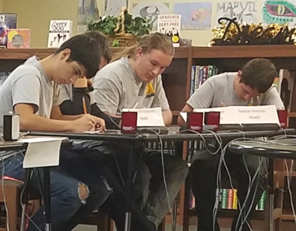 Madill Wins One Match, Loses Two at Academic Regional Nov. 11
